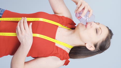 Vertical-video-of-To-follow-a-diet-plan-by-drinking-water.
